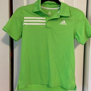 Green and white Adidas polo